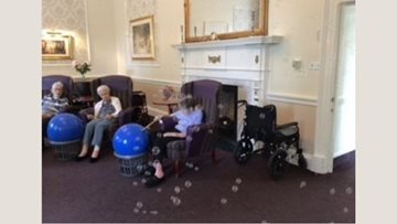 Residents enjoy exercise class at Edinburgh care home